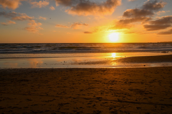 The sunset at the beach at Forrest Caves on Wednesday, hours after four people were pulled from the sea.