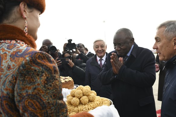 South African President Cyril Ramaphosa (second from right) is offered chak-chak at Kazan International Airport before the BRICS summit.