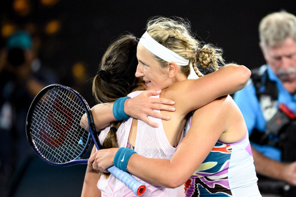 Victoria Azarenka embraces Jessica Pegula after prevailing in their match in straight sets. 