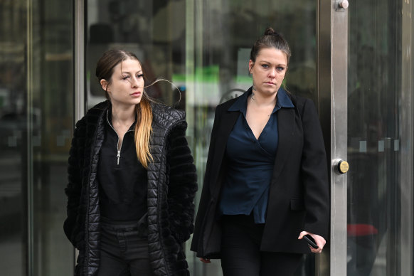 Declan’s mother, Samantha Cutler (right), leaves court on Wednesday with a friend.