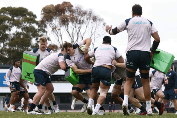 Tom Hooper taking the ball up in training.