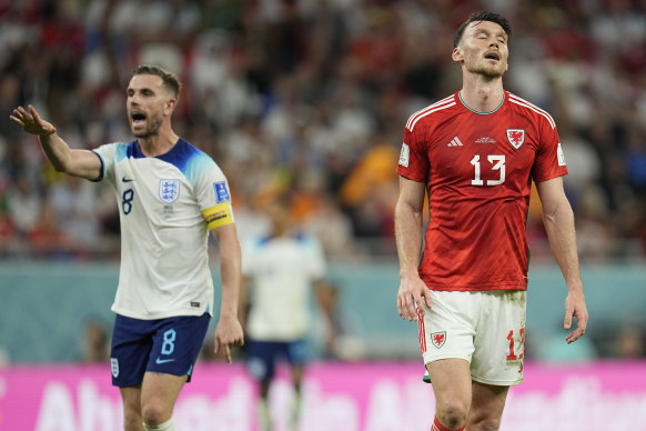 Wales’ Kieffer Moore (right) sums up a frustrating World Cup campaign.