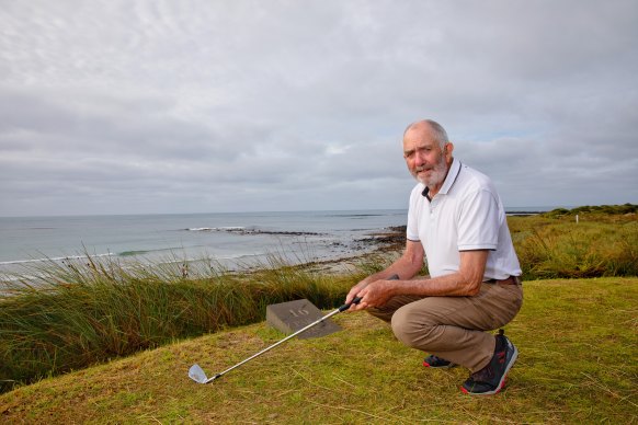 Rex Grady near the barrier erected by the Port Fairy golf club to protect the course from rising seas.