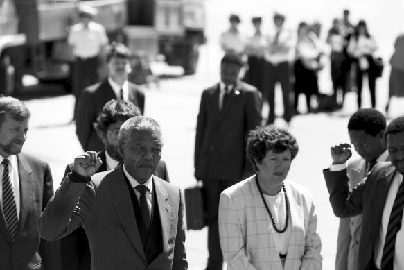 Nelson Mandela is greeted by Joan Kirner at Melbourne Airport in 1990.