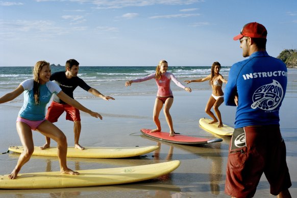 Learn from the pros at Byron Bay Surf School.