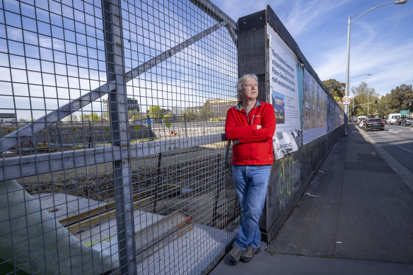 Glen McCallum, a local who supports more social housing in his area, stands at the Fitzroy Gasworks site.