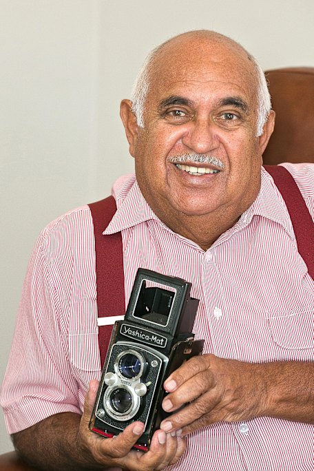 Mervyn Bishop in his Dubbo home with his camera collection.