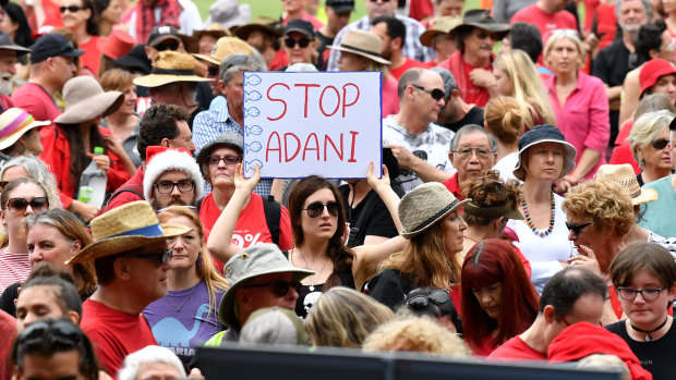 Anti-Adani protestors gathered at Crosby Park in Brisbane on Saturday.