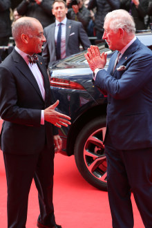 You say hello, I say namaste: Prince Charles meets Sir Kenneth Olisa, The Lord-Lieutenant of Greater London (left) on March 11. The Prince tested positive for Covid-19, it was announced on March 25.