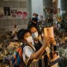 Public grief over Queen’s death doubles as dissent in Hong Kong