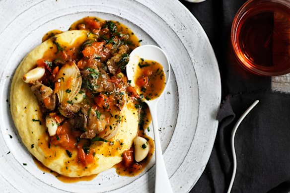 Tender lamb is punctuated by glossy pearl onions and garlic.