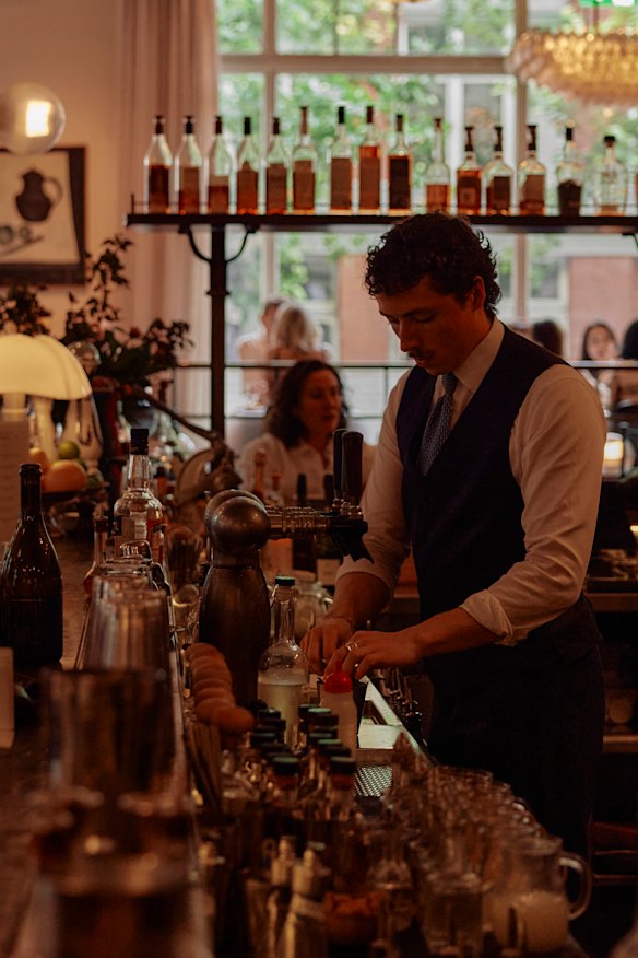 Solo diners can take a seat at Gimlet’s central bar.