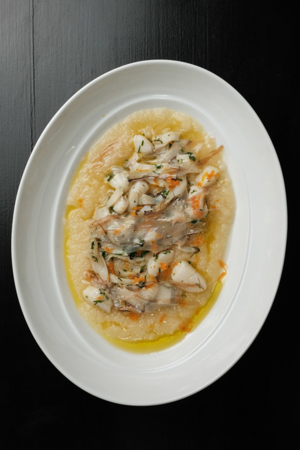 Soft polenta with prawns and pancetta. 