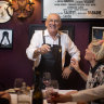 No bread plates: Bistro Thierry owner Thierry Cornevin with customers Alice Wells and Jack Lodge.