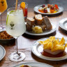 Snacks include the signature chicken liver parfait with potato chips (centre).