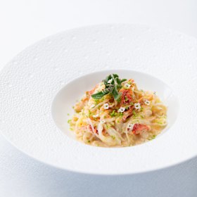 Fermented Thai rice noodles with fresh curried sauce.