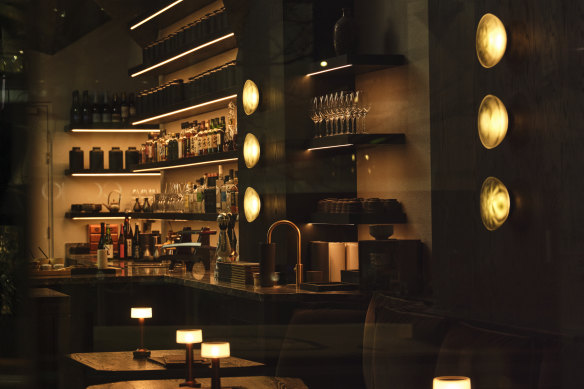 The moody atmosphere of Yugen Tea Bar at night.