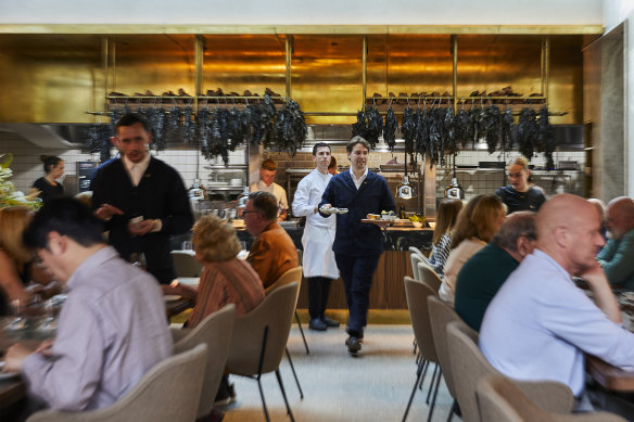 Josh Niland (centre) at the new iteration of his Saint Peter restaurant, in Paddington’s Grand National Hotel.