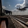 An EA-18G Growler landing on the flight deck of the USS Abraham Lincoln in the Indian Ocean.