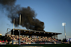 Smoke outside the stadium caused a delay before the game. 