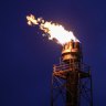 A BP refinery burns off gas in Gelsenkirchen, Germany, Tuesday evening, April 5, 2022.