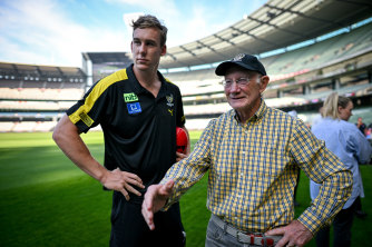 Tom Lynch, left, with Kevin Bartlett at the MCG on Monday. 