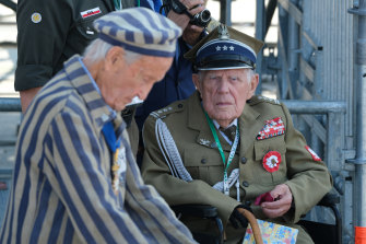 A Polish military veteran and a concentration camp survivor attend an international ceremony in Warsaw on Sunday to commemorate the 80th anniversary of the outbreak of World War II.