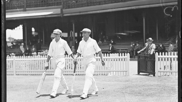 Don Bradman and Sid Barnes going out to bat in 1930. Prime Minister John Howard in 2000 moved to protect Bradman's name from commercial misuse.