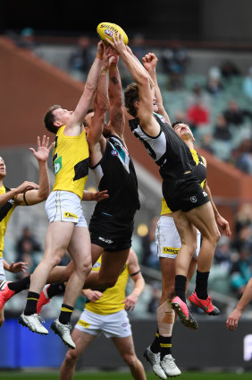 The Power's Mitch Georgiades goes for the mark in round 11. 