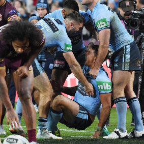Zipped lips: Mitchell claims he didn't direct any words to Chambers when he scored in Origin II.