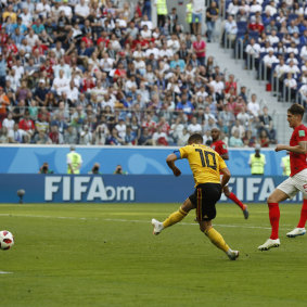 Belgium's Eden Hazard, centre, scores his side's second goal.