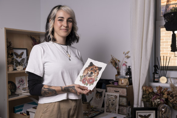 Sydney tattoo artist Marcela Menga with one of her pet portraits.