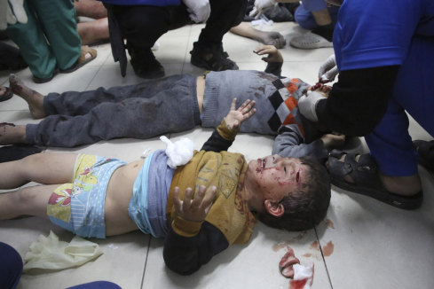 Palestinian children wounded by Israeli bombardment of Gaza are treated in a hospital in Rafah.