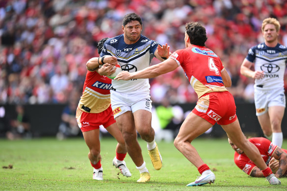 Jason Taumalolo runs the ball for the North Queensland Cowboys against the Dolphins. 