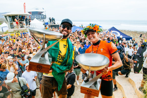 Winners are grinners: 2022 world champions Filipe Toledo and Stephanie Gilmore.