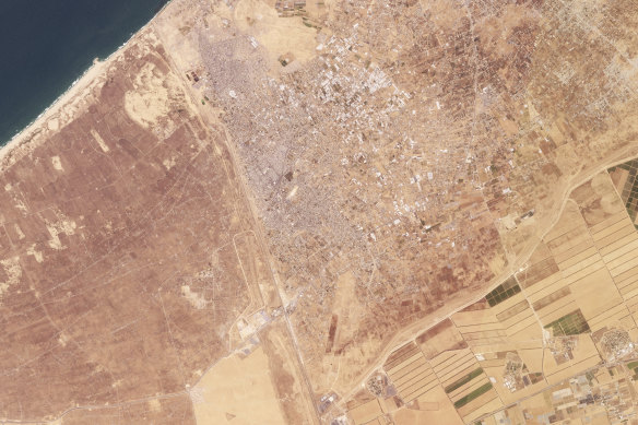 The city of Rafah in southern Gaza Strip on Saturday. Israeli farms can be seen across the border (bottom right).