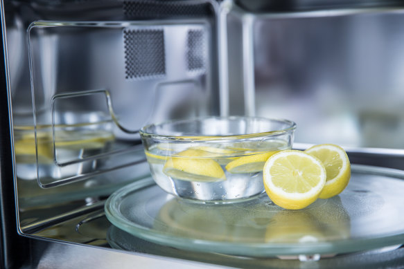“You put the bowl inside the microwave, and then run it for two minutes,” Brouard says. The acid in the lemon helps cut grease.