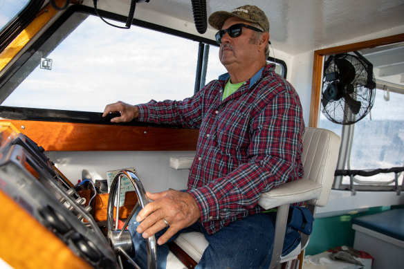 Mark Haynie drives a boat between Crisfield, Maryland and Tangier Island in Virginia.