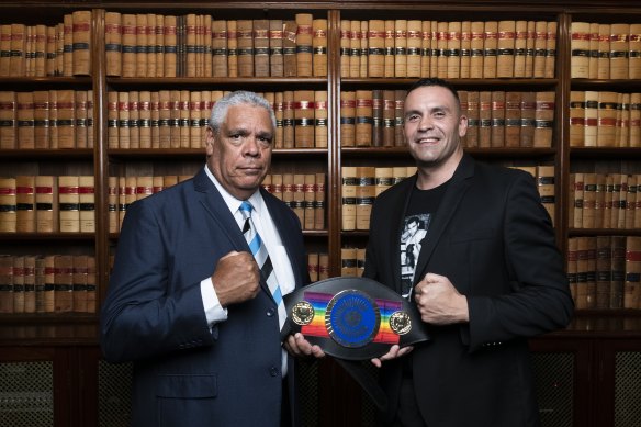 Phillip Dotti and Dave Sands’ grandson Chad Ritchie with the replica belt.