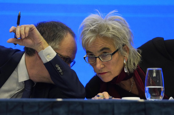 Marion Koopmans, right, and Peter Ben Embarek of a World Health Organisation team chat to each other during the joint press conference in Wuhan. 