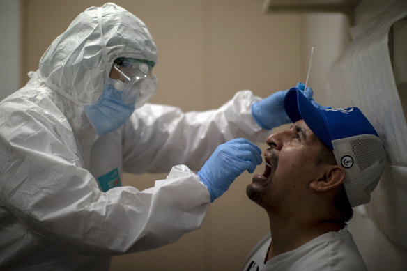 A man is tested for coronavirus in Barcelona, Spain.