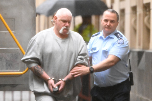 Darren Chalmers (left) arrives at the Supreme Court of Victoria in Melbourne.