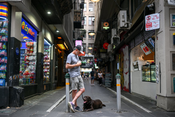 John Lourens and his labrador Marley stop for a coffee in the CBD.