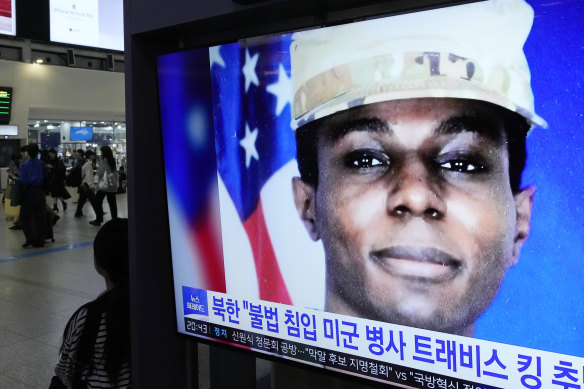A TV screen shows a file image of American soldier Travis King during a news program at the Seoul Railway Station in Seoul.