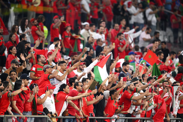 Morocco fans celebrate their 2-1 victory.