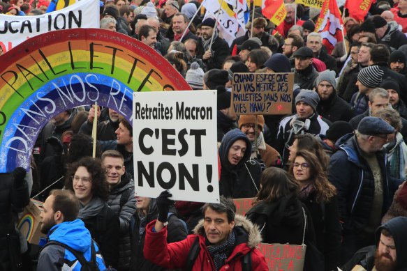 French unions during a protest in Paris on Friday ahead of the government's release of a bill redesigning the retirement system.