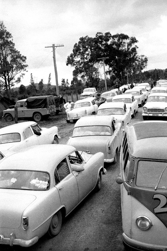 Police and media vehicles assembled in the Hunter region on the day of the capture of prison escapee Kevin Simmonds.