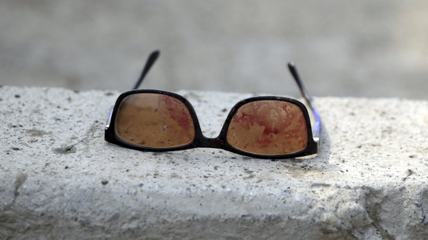 Sunglasses covered in blood are left at the site of a suicide attack in Kabul targeting Afghanistan's minority Hazaras.