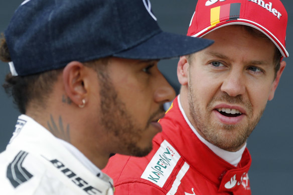 Poles apart: Hamilton and Vettel have often clashed, both on and off the track.