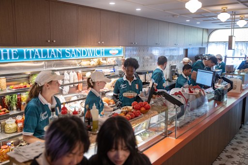 The orange Laminex counter runs the length of Sangaweech.